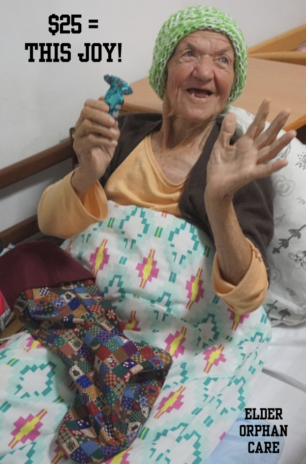 Woman excited to receive a Christmas Stocking of Joy