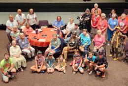 Photo of older adult EOC clients and volunteers at a Summer Celebration event